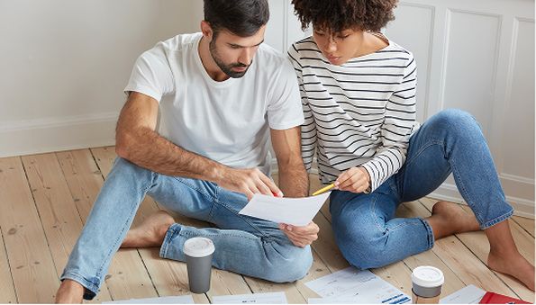 Couple planning luxury vinyl flooring installation