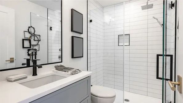 Modern bathroom with glass walk-in shower
