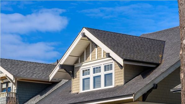 New asphalt shingle roof installed on a residential home