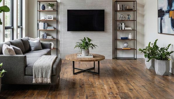 Refinished hardwood floors in a bright living room