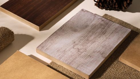 Laminate flooring samples on textured surface