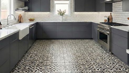 Kitchen with patterned tile flooring