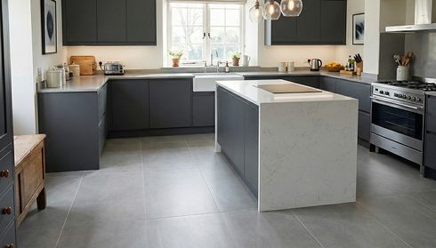 Modern kitchen with large gray tile flooring